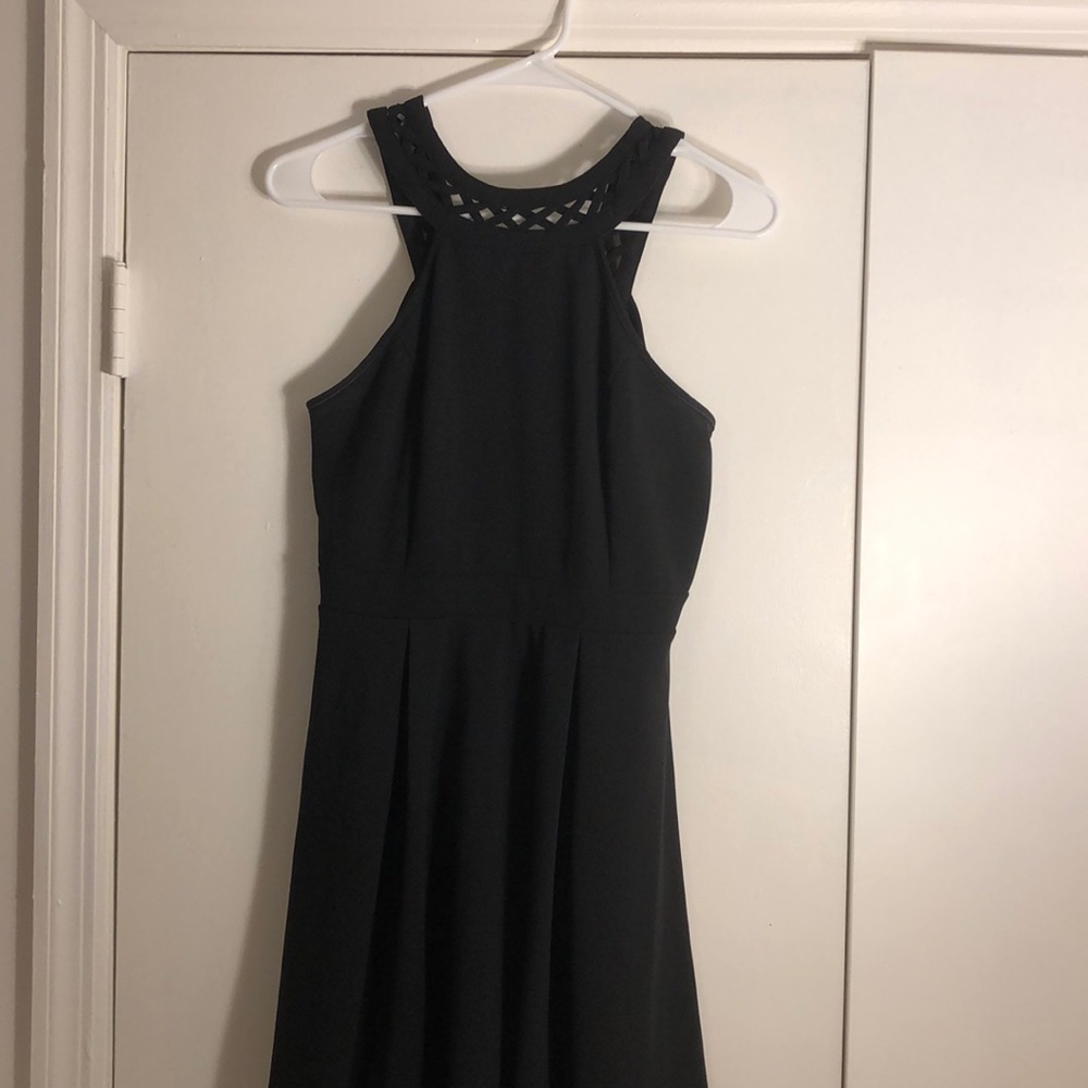 black skater dress with high cut out neck
